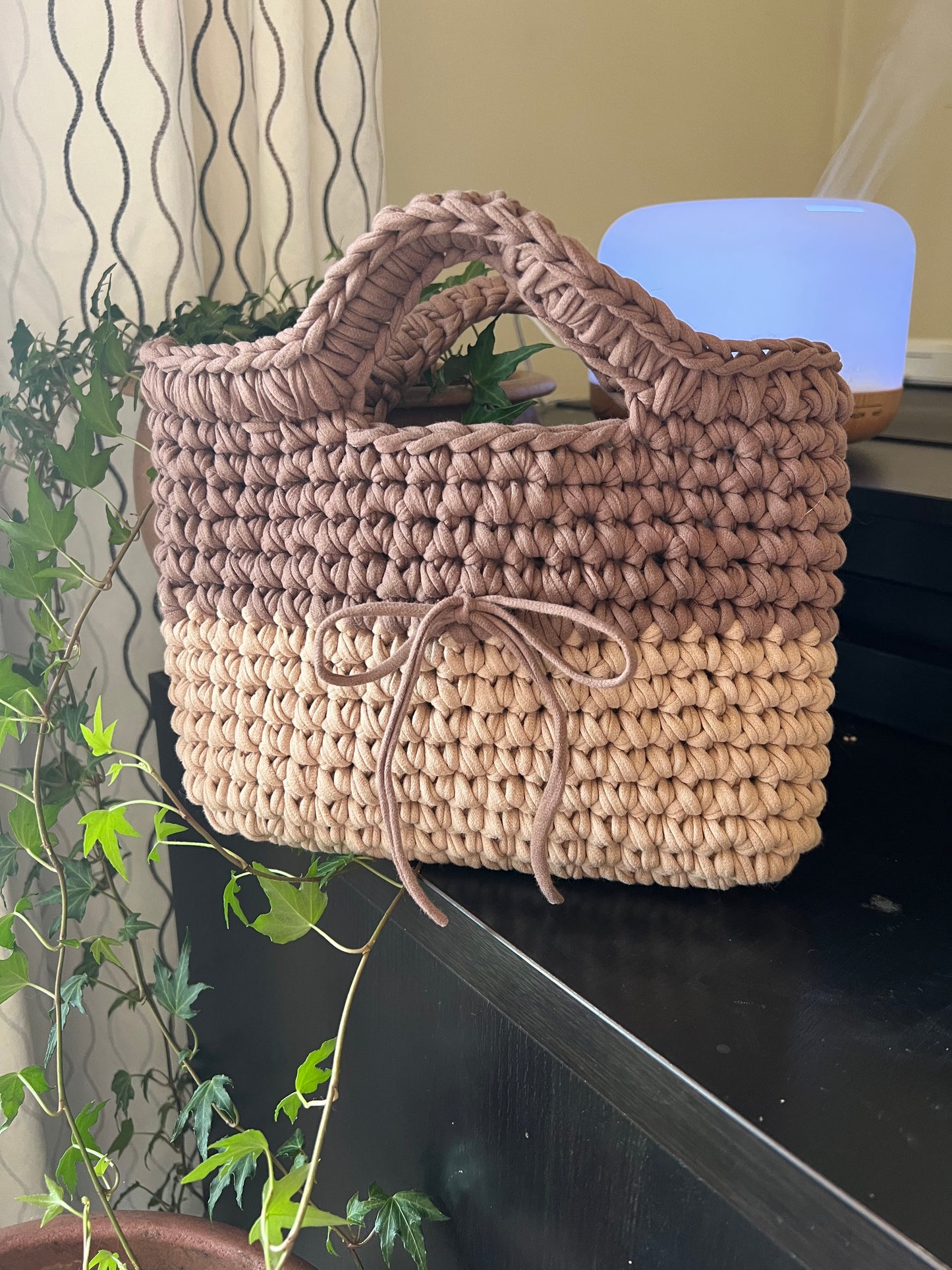 Tan and cream handmade crochet tote clutch bag with bow strap detail