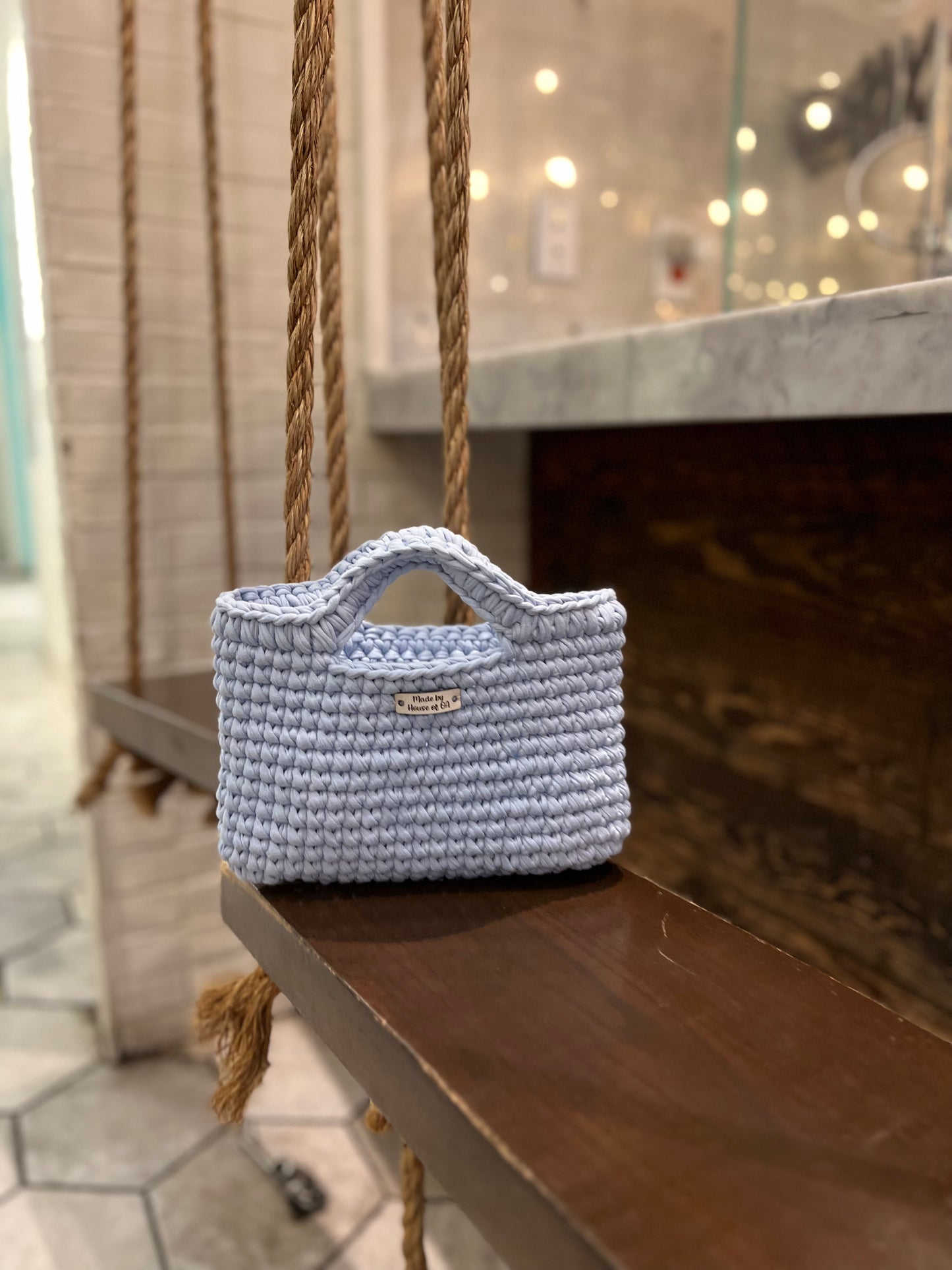 Blue handmade crochet tote clutch bag with bow strap detail