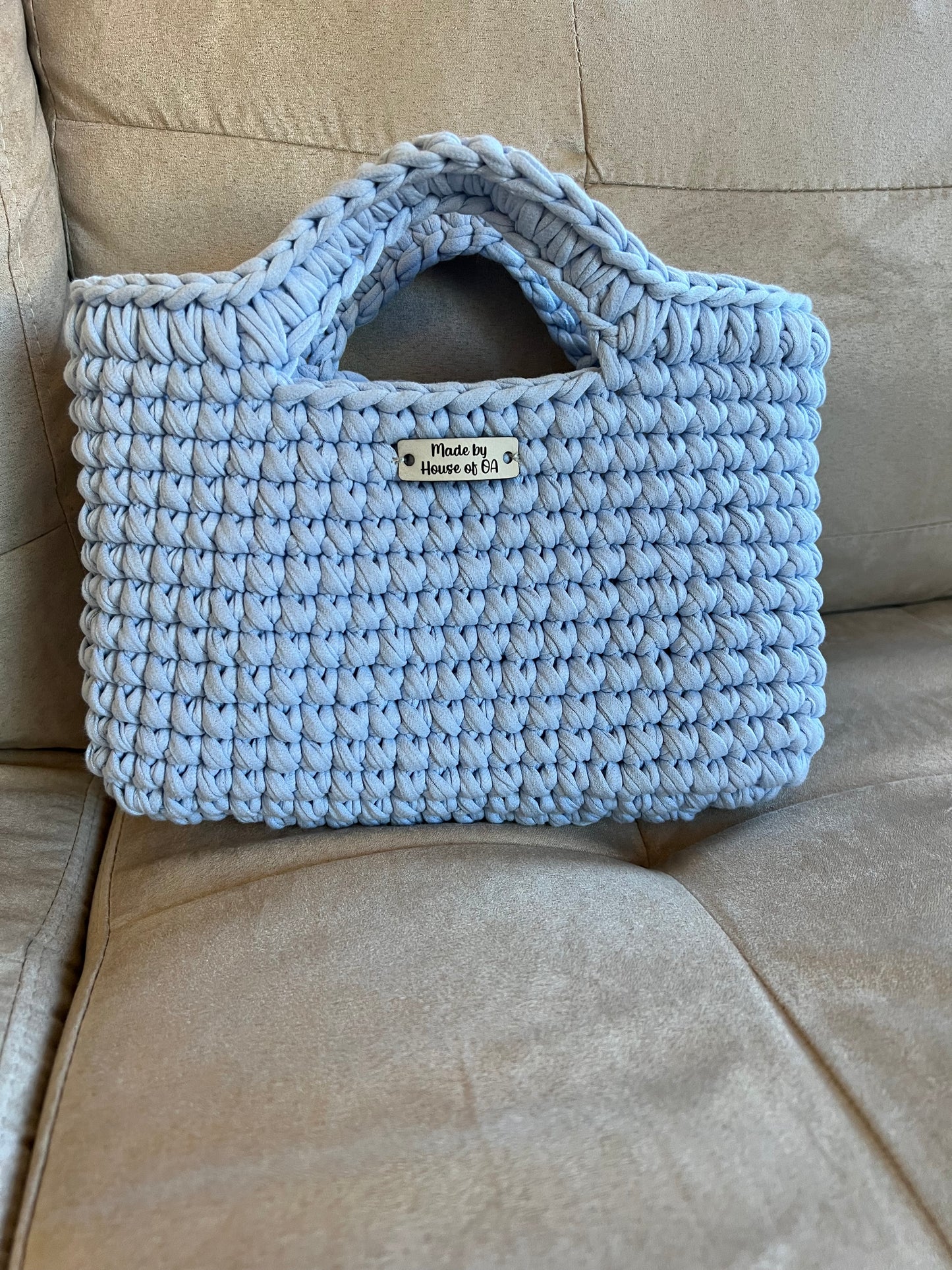 Blue handmade crochet tote clutch bag with bow strap detail