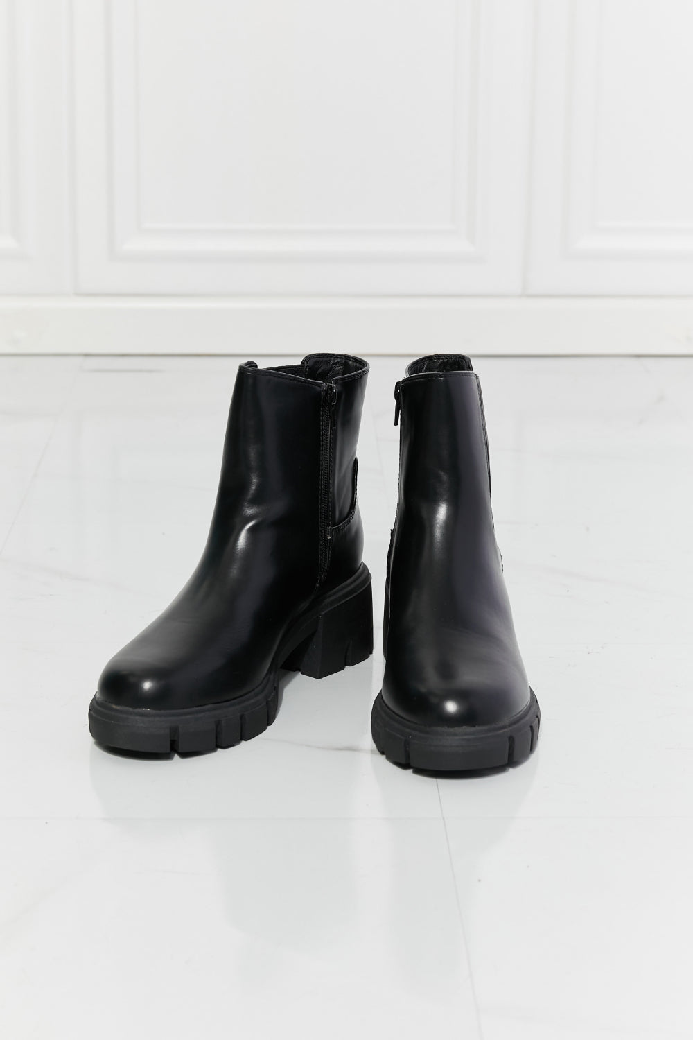 Lug Sole Chelsea Boots in Black