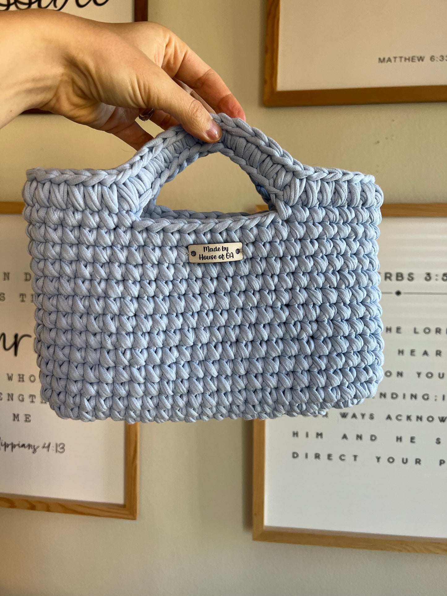 Blue handmade crochet tote clutch bag with bow strap detail