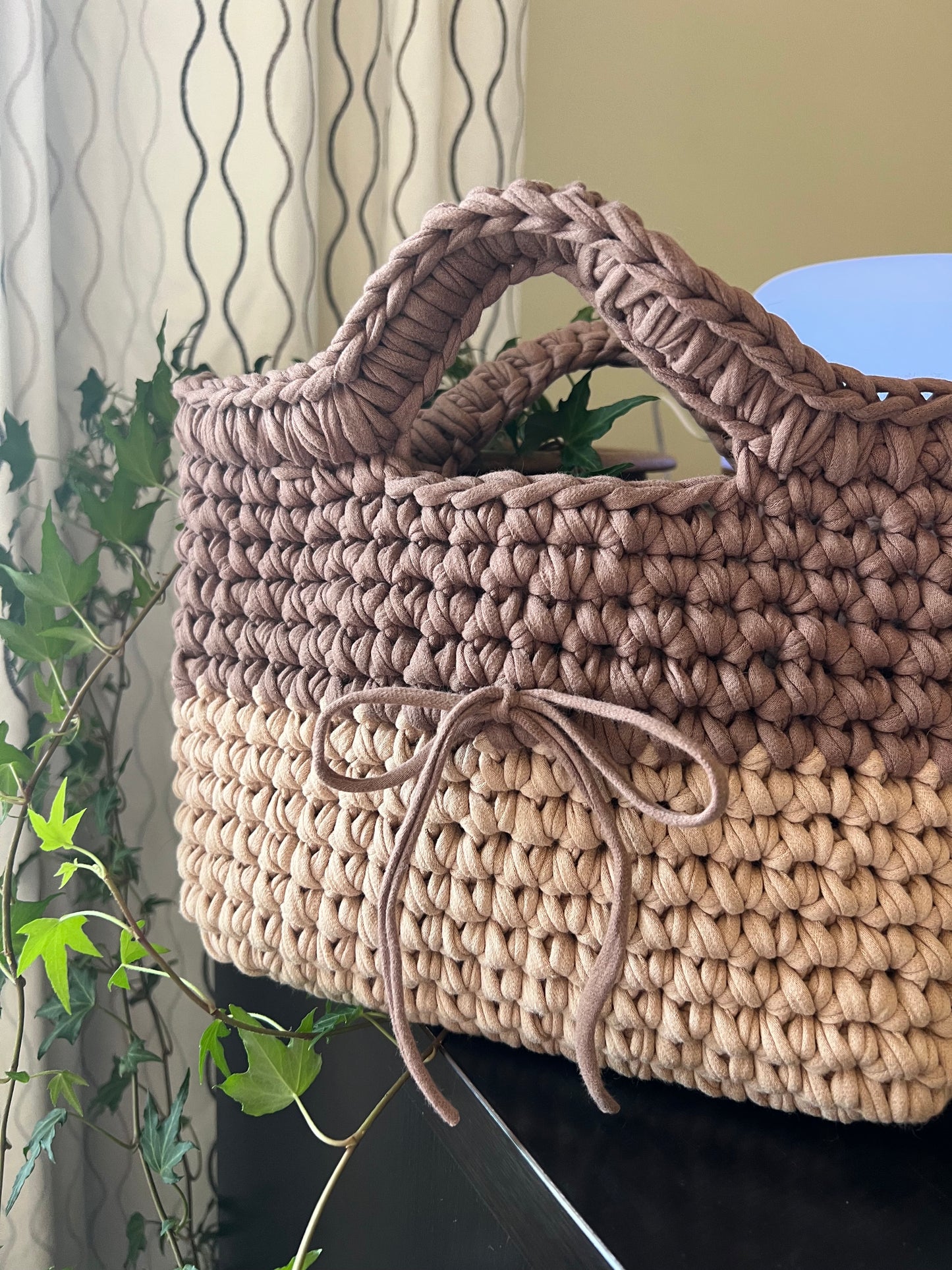 Tan and cream handmade crochet tote clutch bag with bow strap detail