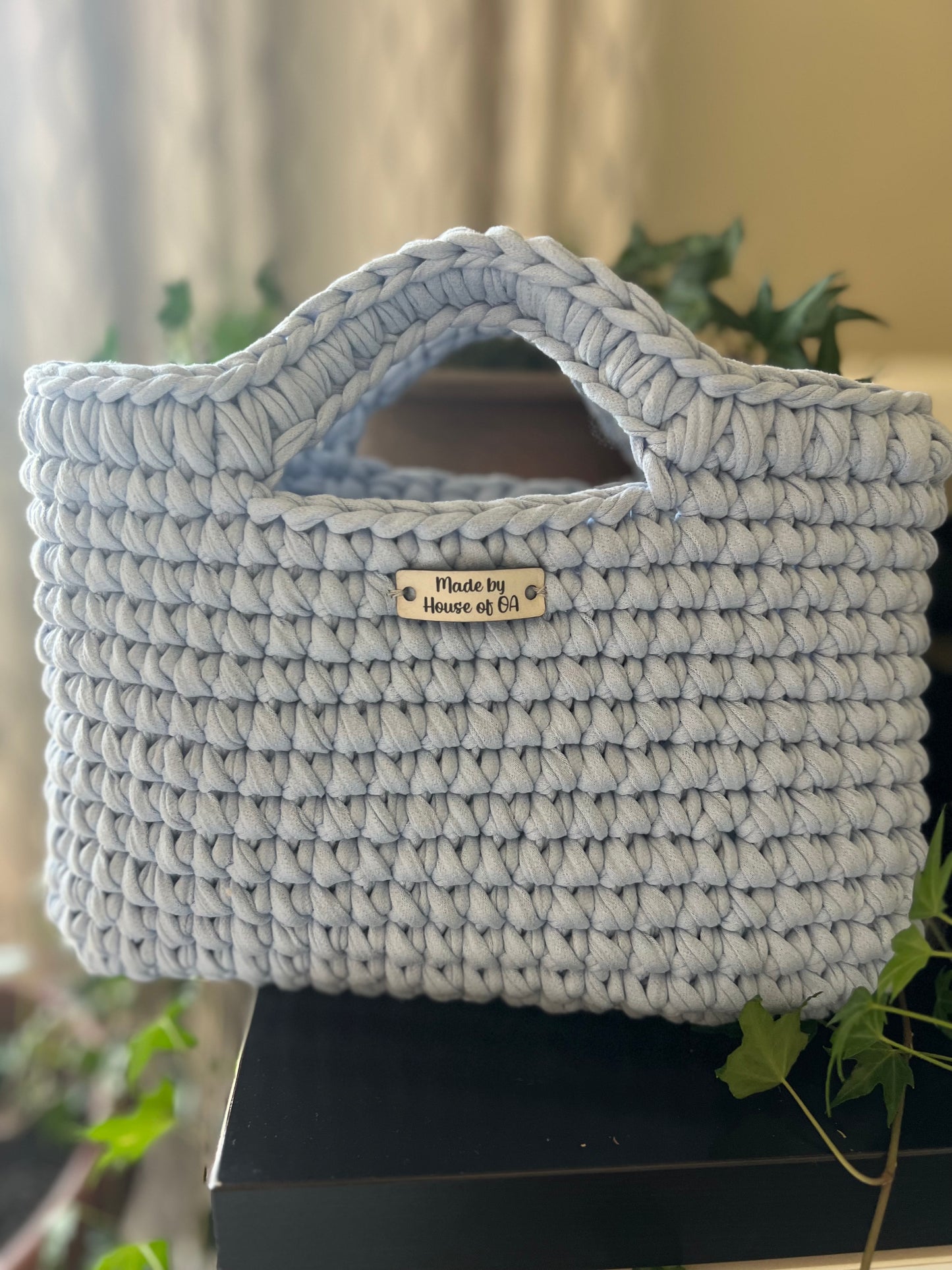 Blue handmade crochet tote clutch bag with bow strap detail