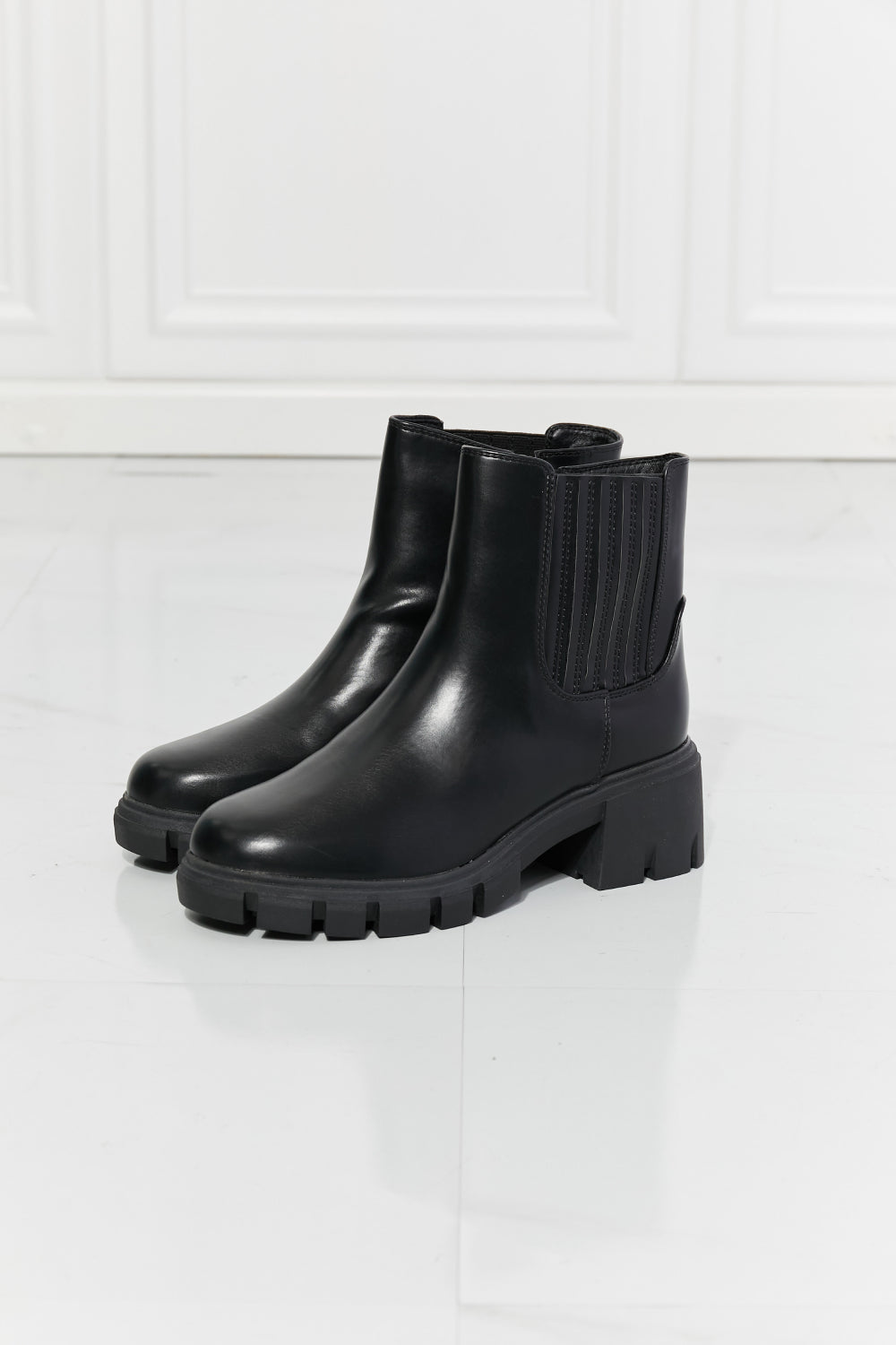 Lug Sole Chelsea Boots in Black