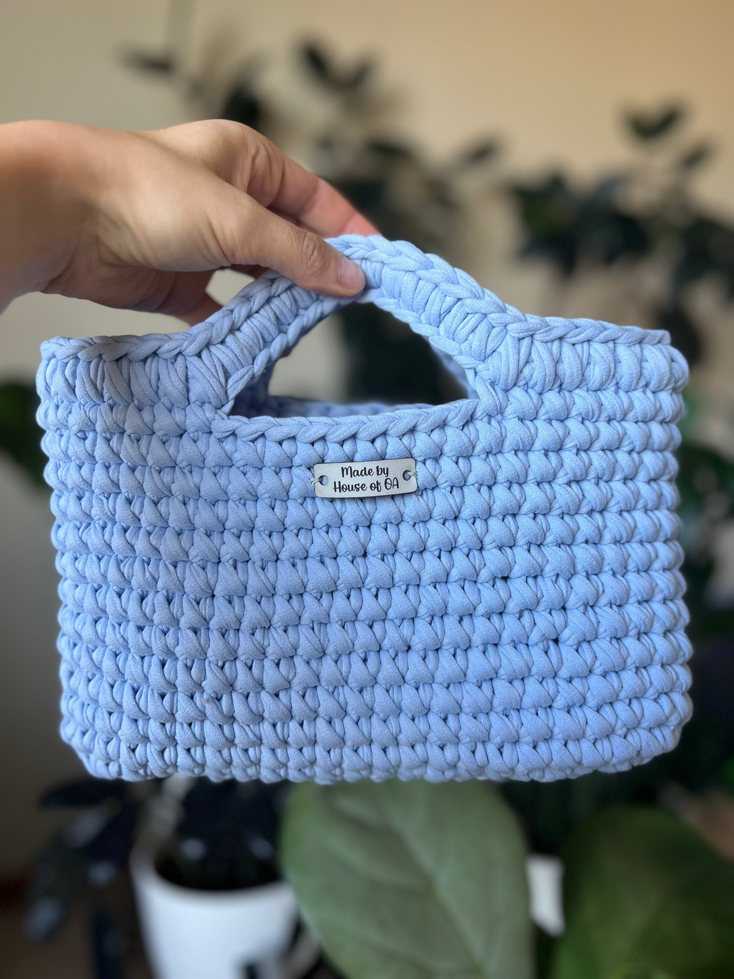 Blue handmade crochet tote clutch bag with bow strap detail