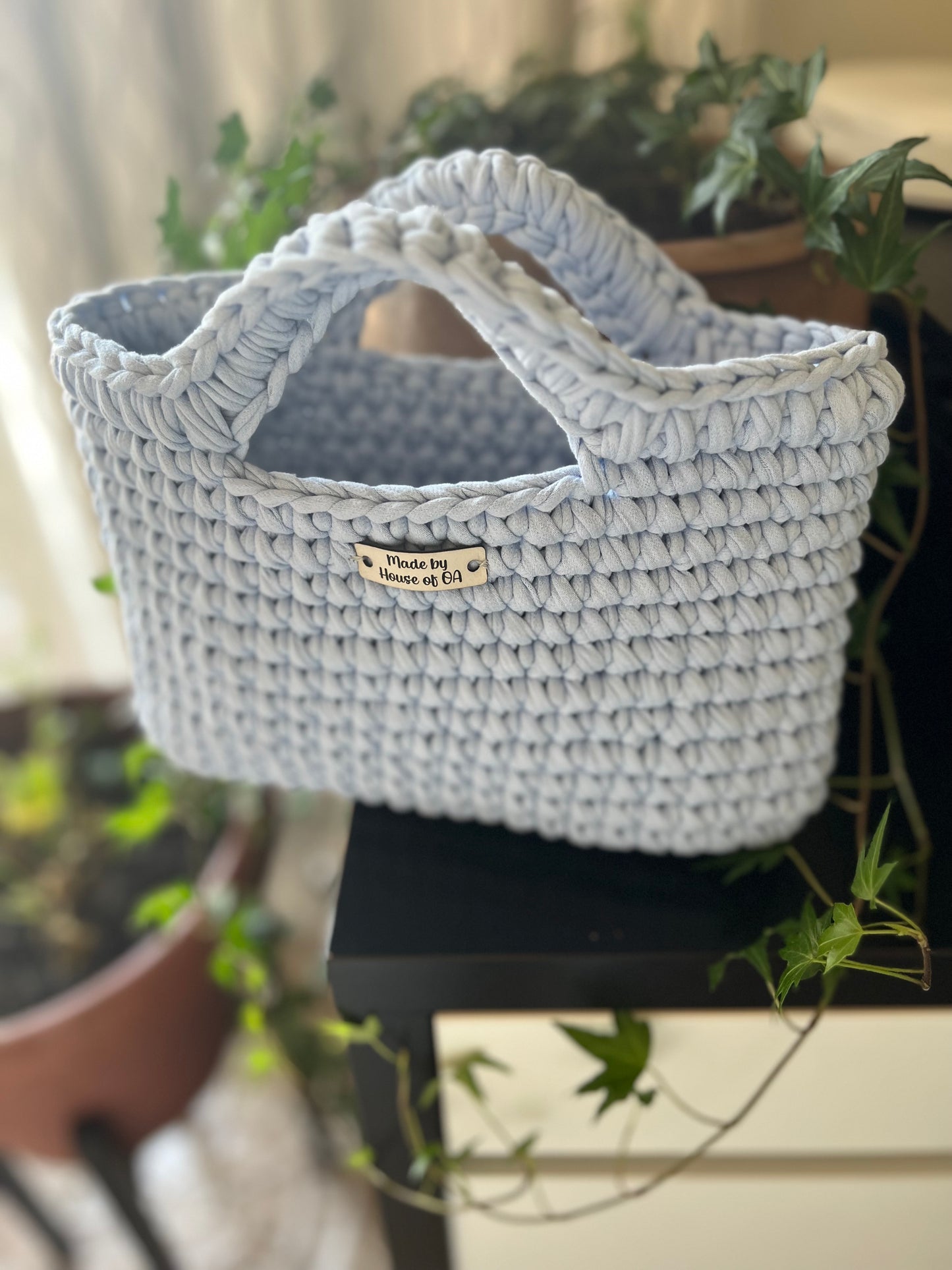 Blue handmade crochet tote clutch bag with bow strap detail