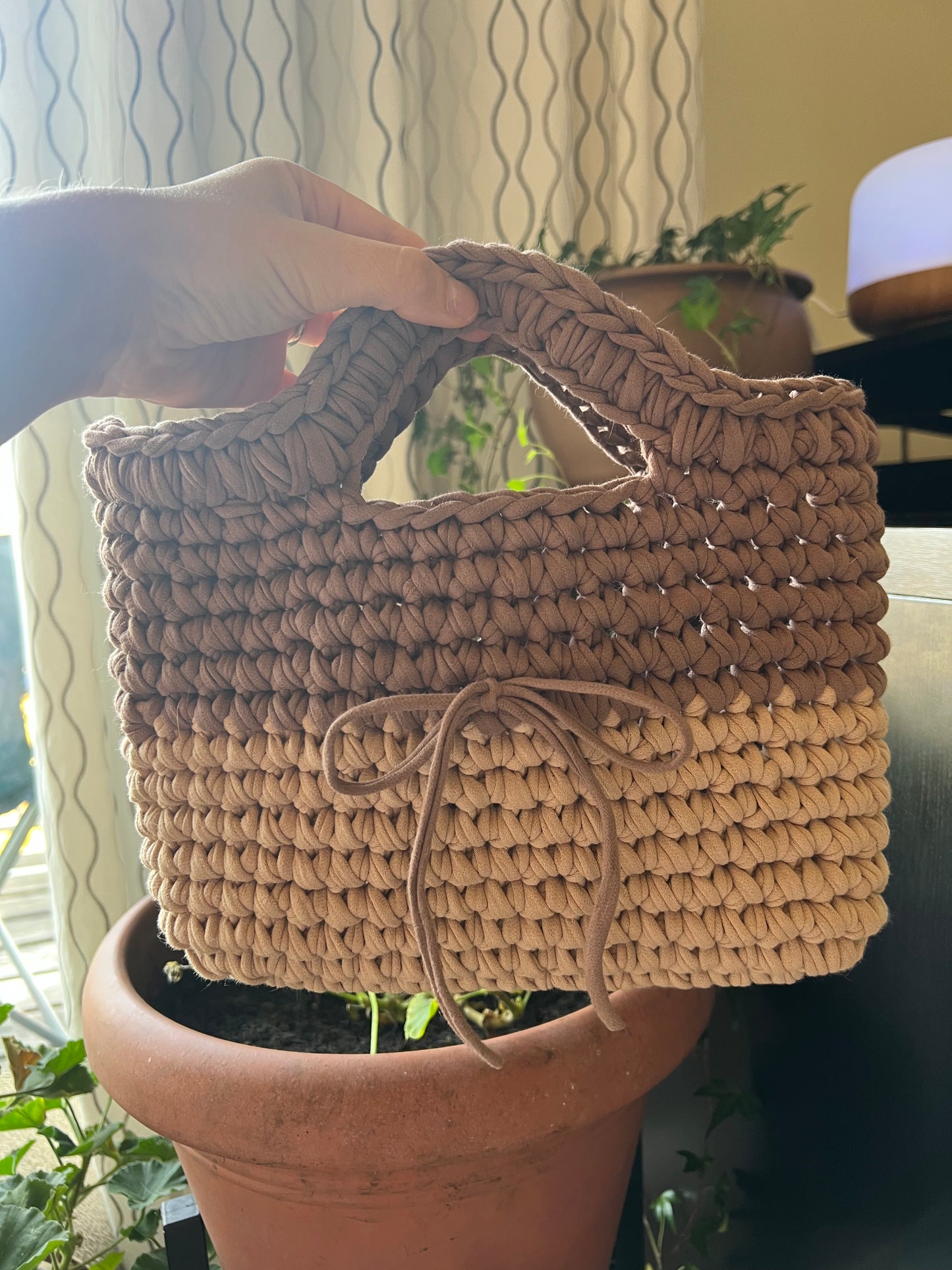 Tan and cream handmade crochet tote clutch bag with bow strap detail