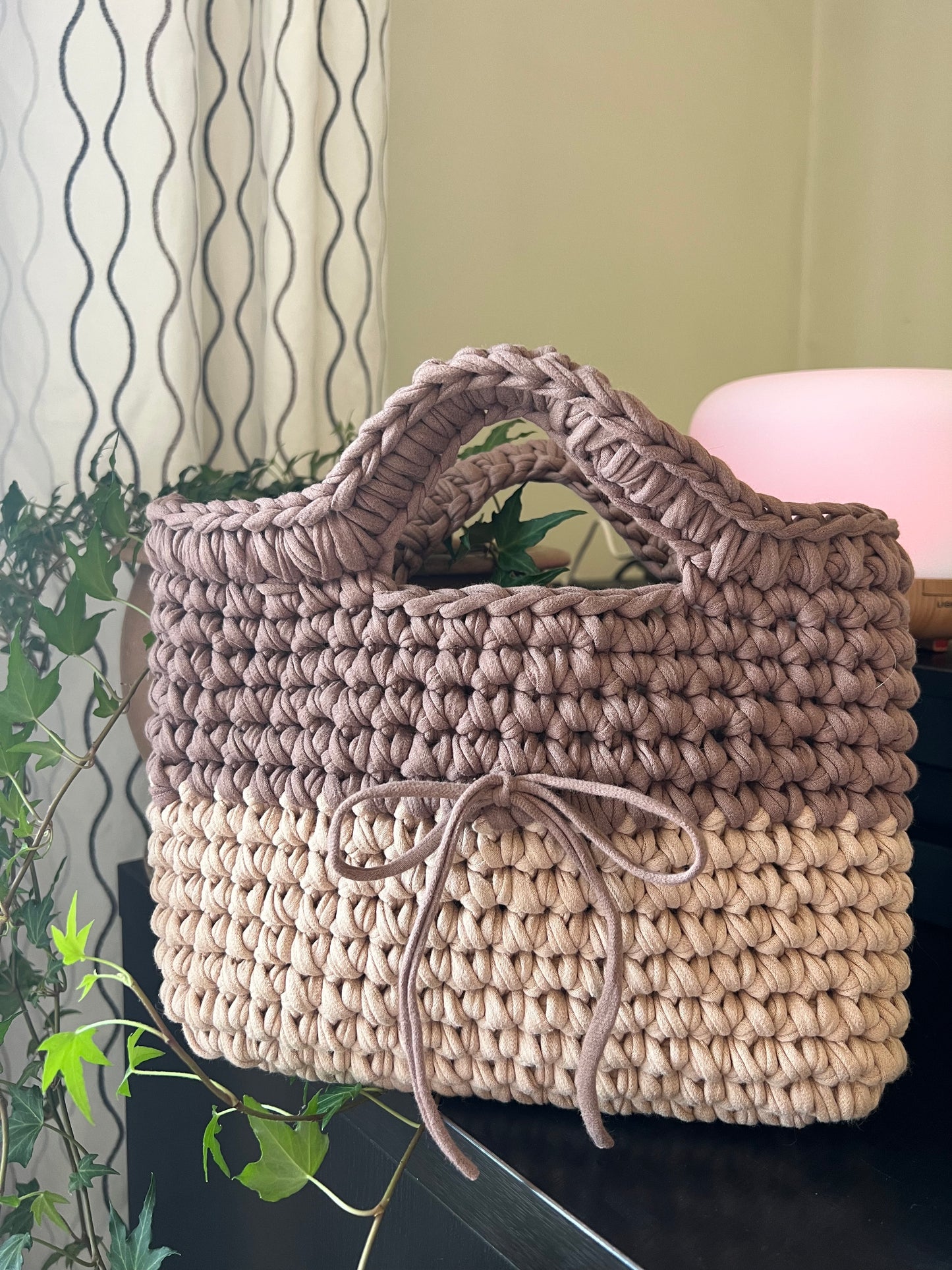 Tan and cream handmade crochet tote clutch bag with bow strap detail