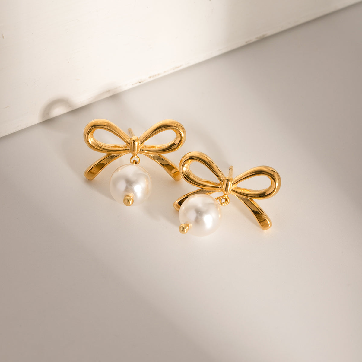 Gold-plated Stainless Steel Bow Pearl Earrings